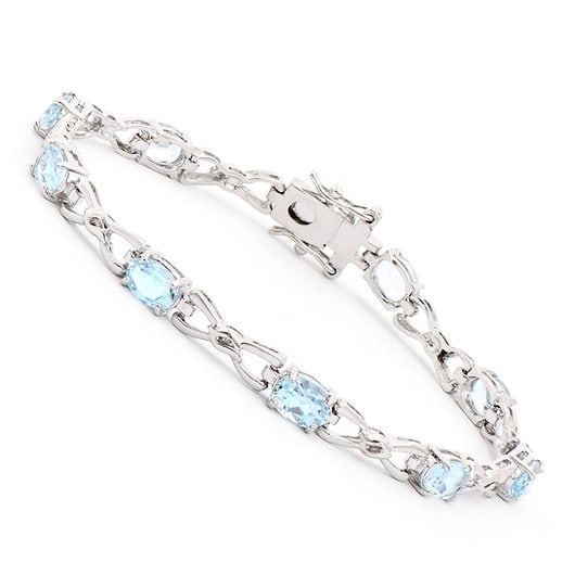 8.55 ctw Blue Topaz Rhodium Plated Designer Bracelet $1,675!: Gemstone DescriptionGemstone: Blue TopazColor: Sky BlueShape: OvalSize: 7x5Quantity: 9CTW: 8.55 Material Information:Plating Material: RhodiumPrimary Material: Base Metal Jewelry Information:Mount Typ