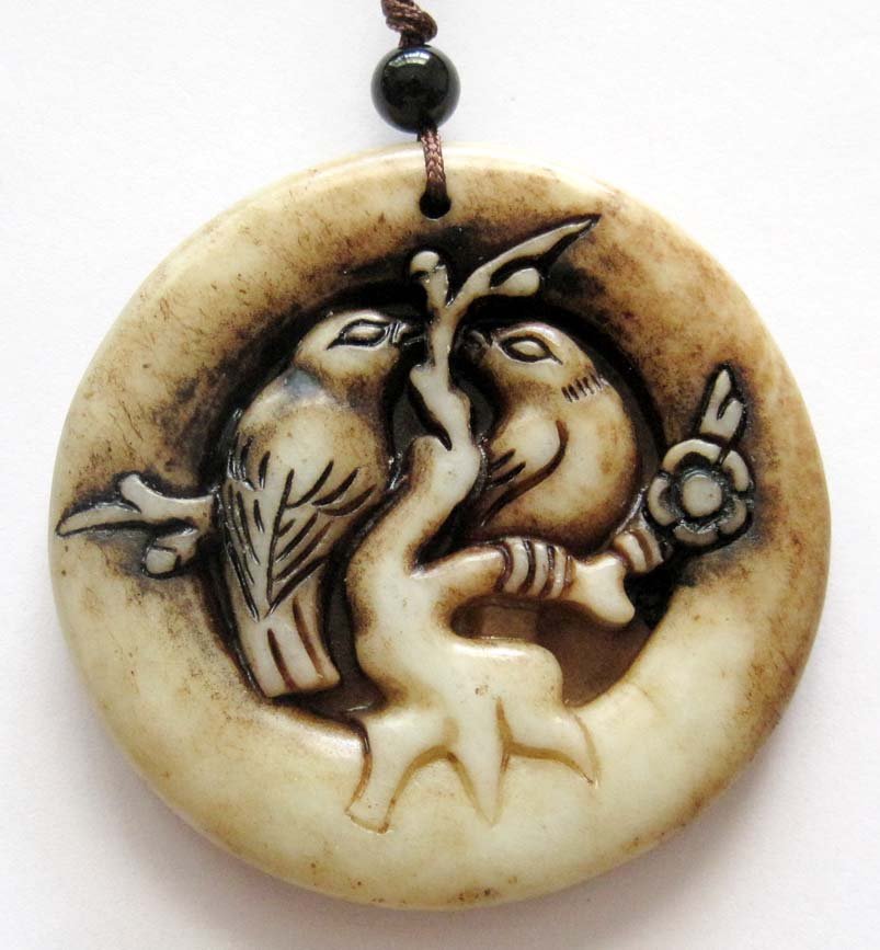 Zhou Dynasty Natural Jade Birds Of Paradise Amulet: Approx Size: 2" Diameter. It is the customary and traditional belief of Chinese people that wearing the jade is the good means of which people will be protected from bad luck, evil spirit and danger. 