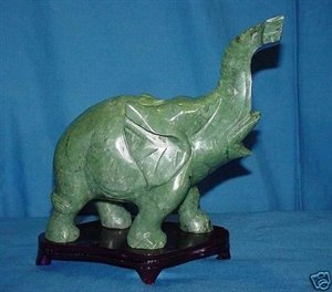 PAIR OF JADE ELEPHANTS: This pair of elephants are made from green taiwan jade. Very detailed carving. L: 7", W: 3", H: 6".