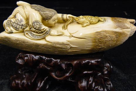 Rare Hand Carved Ivory Young Man and a Frog: This beautiful art is all hand carved from natural Mammoth Ivory. This is a old man. It is rare and unique. Size: Wide: 6 inch, Deep: 2 inch, High: 2 inch. About the Mammoth Ivory: Mammoth Ivory is a