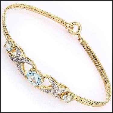 1.41 CT Blue Topaz & Diamond 18KGP Designer Bracelet: 1 piece of GENUINE 8x6 mm oval Blue Topaz quality AAA no treatment.2 pieces of GENUINE 6x4 mm oval Blue Topaz quality AAA no treatment.2 pieces of GENUINE single cut diamonds, 0.02 carat tw.4.95 grams