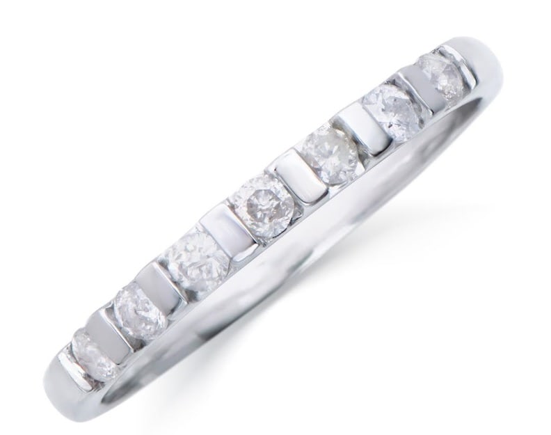 0.235 Cts Certified Diamond 14K Designer Gold Ring $5,109: 0.235 Ct of Round shape Diamonds 2.1 mm.Color: H-I, Quality: I1-I2.1.81 grams 14K solid white gold.Size 7.5 .Comes with signed certificate for $5,109.00