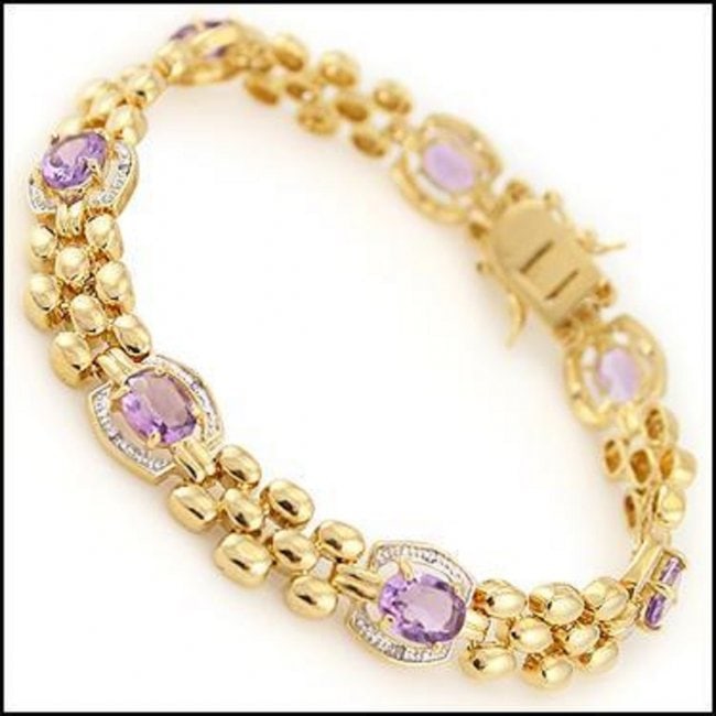 7.60 Cts Amethyst & Diamond Designer Bracelet $1,565: 7 pieces of GENUINE 8X6mm Ovals Amethysts quality AAA no treatment.14 pieces of GENUINE 1.1mm faceted round diamonds, I2-I3 no treatment.19.55 grams of brass layered with 18K yellow gold.The length is