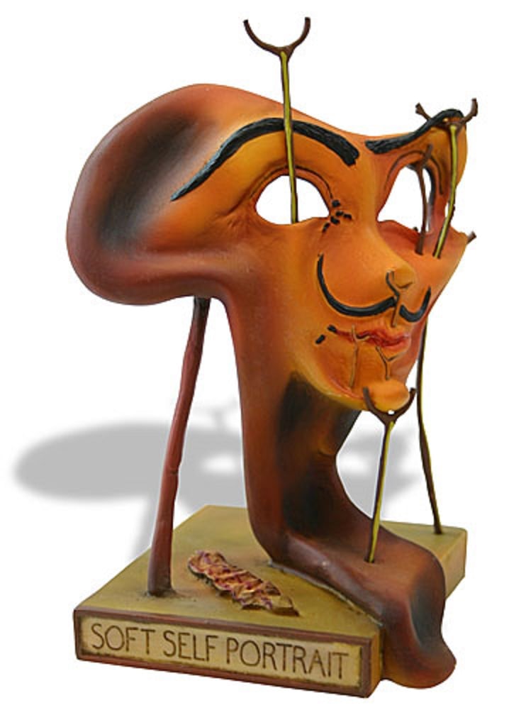 Salvador Dali SOFT SELF PORTRAIT WITH FRIED BACON Sculpture: This is a sculpture entitled "SOFT SELF PORTRAIT WITH FRIED BACON" (1941) by Salvador Dali. This is a highly collectible, quality, resin sculpture with hand-painted color details, matte and glossy fin
