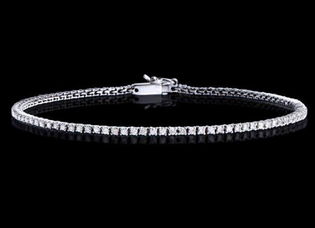 1.12 Cts Tennis Diamond Designer Gold Bracelet $15,850!: 1.12 Ct of Round shape Diamonds 1.4 mm: Color: H-I, Quality: I1-I2.5.33 grams 14K solid white gold. Size 7.5" Comes with signed Certificate $15,850.00!Great Jewelry investment gold is going up!
