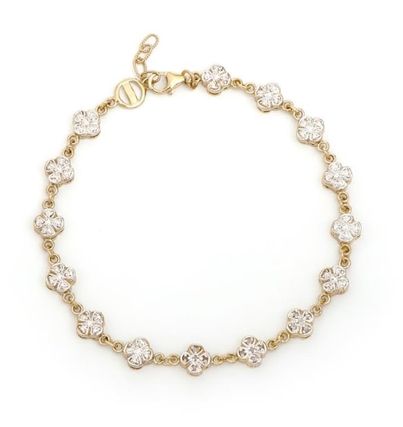 0.11 Cts Diamond 18KGP Designer Bracelet: 15 Single cut 1.1mm rounds diamonds Color: I-J & Clarity: I2-I3 No treatment.6.85 grams of brass layered with 18k yellow gold.Length is 7 1/2 inches.The width is 1/4 inches.