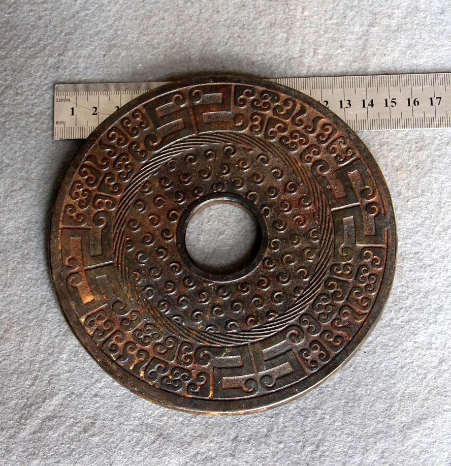 Hand Carved Jade Protection Shield Carving Disc: Approx Size: 5 3/4" Diameter The Chinese love jade because of not only its beauty, but also more importantly its culture, meaning and humanity, as Confucius (551 BC - 479 BC) said there are 11 De (vir