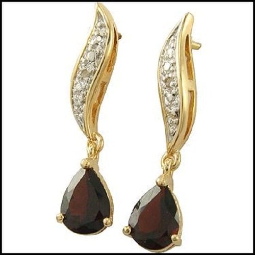 1.82 CT Garnet & Diamond 18KGP Designer Dangle Earrings: 2 pieces of GENUINE 2X3 mm Pear shape Garnets quality AAA no treatment.2 pieces of GENUINE single cut diamond 0.04 carat tw.5.19 gram of base metal layered with 18K yellow Gold.