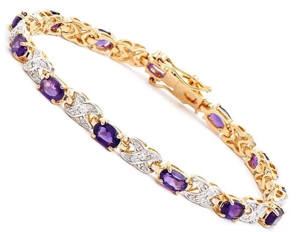 5.31 ctw Natural Amethyst Diamond 18KGP Designer Bracelet $1,695!: Gemstone DescriptionGemstone: AmethystColor: VioletShape: OvalSize: 6x4Quantity: 13CT: 5.2 Diamond DescriptionShape: RoundSize: 1.1mm Quantity: 13CT: 0.11Grade: I2Color: H-I Material Information:Plati