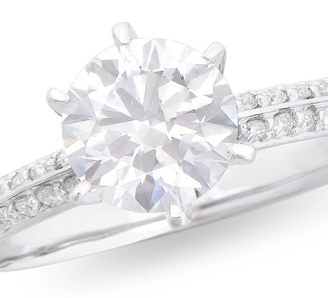 $13,895 Value! 1.34 Cts IGI Certified Top Lab Grown Designer Diamond Ring E VS1 IDEAL Cut: Main Lab Grown Diamond Description: Shape: Round Size: 6.70mm Quantity: 1: 1.13 ctGrade: VS 1Color: E Side Lab Grown Diamonds Description: Shape: RoundSize: 1.4mm Quantity: 16: 0.21 ctGrade: VS 1Color