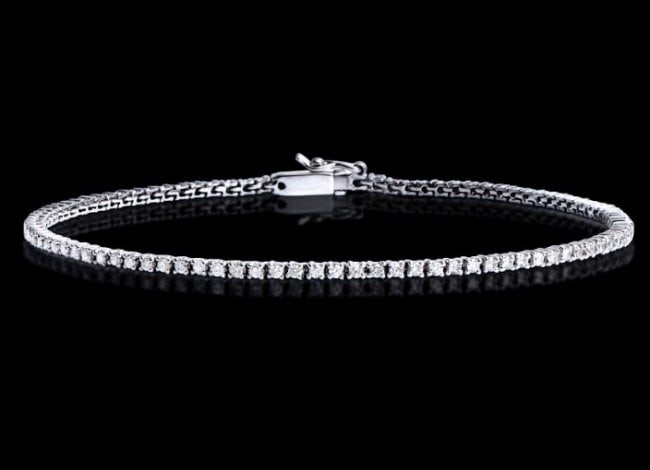 1.12 Cts Tennis Diamond Designer Gold Bracelet $15,850!: 1.12 Ct of Round shape Diamonds 1.4 mm: Color: H-I, Quality: I1-I2.5.33 grams 14K solid white gold. Size 7.5" Comes with signed Certificate $15,850.00!Great Jewelry investment gold is going up!