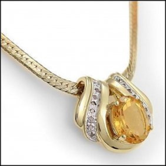 6.14 CT Citrine & Diamond Designer Necklace $1,235: 1 piece of GENUINE 12X10mm faceted oval Citrine quality AAA no treatment.16 pieces of GENUINE single cut diamonds 0.12 carat tw.10.22 grams of brass layered with 18K yellow Gold.The length is 18 inche