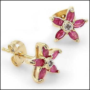 1 CT Ruby Diamond Marquise Star Earrings: 1 CT Ruby Diamond Earrings. The natural stone is mined from the ground, cut, polished and hand set in fine 925 sterling silver and layered with 18K Gold. The height is 3/8inches or 9mm and the width i