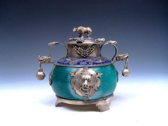 Tibetan Silver Lion Tripod Cloisonne Incense Burner Buf: Item Description: This is a very nice Tibetan silver lion heads armored tripod incense burner with cloisonné rim, buffalo lid and 2 dragon bell handles. Excellent workmanship and the piece looks even