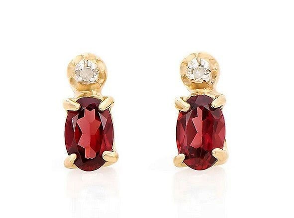 0.97 Ct Natural Diamond Garnet Sterling Silver Designer Earrings MSRP $1,195!: Gemstone DescriptionGemstone: GarnetColor: MargentaShape: OvalSize: 6x4Quantity: 2CTW: 0.95 Diamond DescriptionShape: RoundsSize: 1.1mm Quantity: 2CTW: 0.02Grade: I3Color: H-I Material Information:Pla