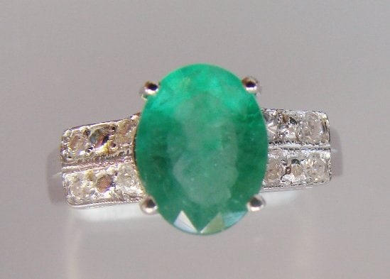 $5,495 Value! 1.75 Ct GLS Certified Natural Diamond Emerald 14K Ring: Gemstone Description:Gemstone: EmeraldColor: GreenShape: OvalSize: 9x7Quantity: 1CT: 1.55 Diamond Description:Shape: RoundSize: 1.2mm Quantity: 24CT: 0.2Grade: I1-I2Color: H-I Material Information:Pri