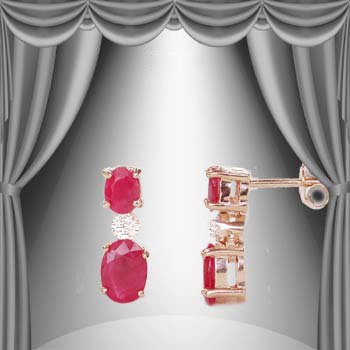 Genuine 3 CT Ruby Diamond Dangle Earrings: Master jewelers designed your jewelry with 4 pieces of GENUINE oval GENUINE rubies. 2 pieces of GENUINE single cut diamonds .1 carat tw. Set in Sterling Silver layered with 14K gold.