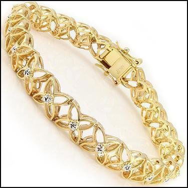 0.74 CT Diamond " For Ever Love" 18k Bracelet: Master jewelers designed your bracelet with: 21 Single cut diamonds. 11.35 grams of sterling silver layered with 18K yellow Gold. Length is 7 1/2 inches. The width is 1/4 inches. This lovely bracelet