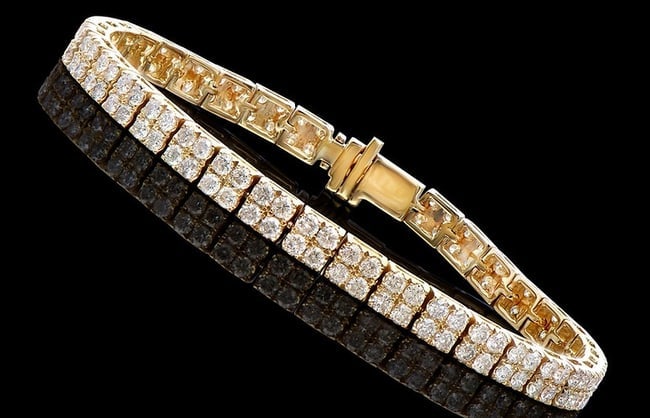 $22,895 Value! 5.15 cts GLS Certified Natural Diamond 14K Designer Gold Bracelet: Diamond Description:Shape: RoundSize: 2mm Quantity: 148CT: 5.15Grade: I1-I2Color: H-I Material Information:Primary Material: 14k Solid Gold (Marked)Color: Yellow Gold Jewelry Information:Mount Type: