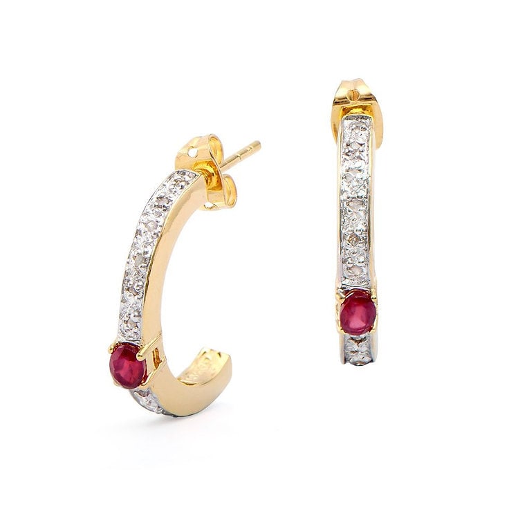 0.68 CT Ruby & Diamond Designer 18KGP Earrings $1,150: 2 pieces of GENUINE 4x3 mm Red Rubies quality AAA no treatment.24 pieces of GENUINE single cut round diamonds 018cts I-J color.4.08 grams of brass layered with 18K yellow gold.The motif width is 5/8 i