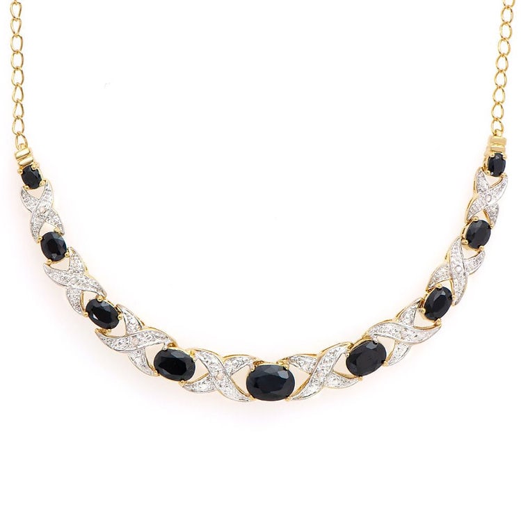 5.29 CT Sapphire & Diamond 18KGP Designer Necklace: 9 pieces of GENUINE Black Sapphires quality AAA no treatment.8 pieces of GENUINE 1.1mm faceted round diamond 0.06 carat Tw I-J color.10.48 grams of base metal layered with 18K yellow gold.The necklace