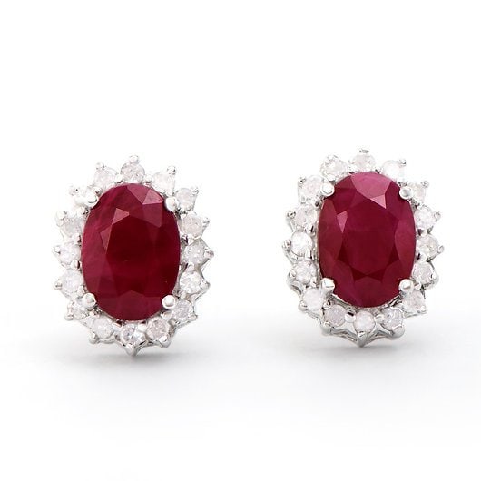 2.31 CTS Certified Natural Diamond African Ruby 14K Gold Designer Earrings $5,800!: Gemstone DescriptionGemstone: RubyColor: RedShape: OvalSize: 7x5Quantity: 2CTW: 2.05 Diamond DescriptionShape: RoundsSize: 1.2mm Quantity: 32CTW: 0.26Grade: I2-I3Color: H-I Material Information:Primar