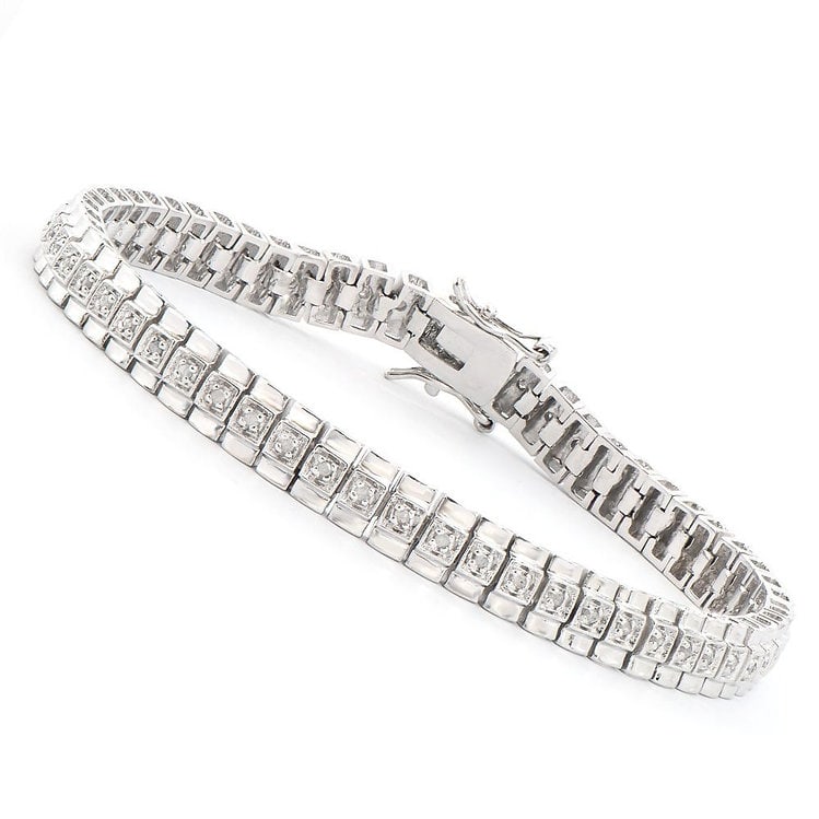 0.32 CT Diamond Designer Bracelet $1,390!: 41 Single cut round diamonds Color: I-J & Clarity:I2-I3 No treatment.10.55 grams of brass layered with platinum rhodium. Length is 7 1/2 inches.The width is 1/4 inches.