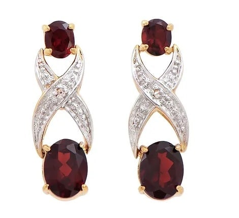 2.86 Cts Natural Garnet Diamonds 18KGP Designer Earrings $1,225!: Diamond DescriptionShape: RoundsSize: 1.1mm Quantity: 2CTW: 0.02Grade: I2Color: H-I Gemstone DescriptionGemstone: GarnetColor: BrownShape: OvalSize: 8x6Quantity: 2CTW: 2.04 Gemstone DescriptionGemston