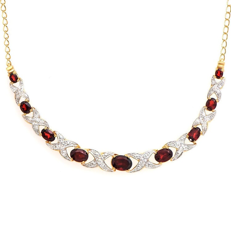 5.19 CT Garnet & Diamond Designer Necklace $1,500: 9 pieces of GENUINE Garnets quality AA no treatment.8 pieces of GENUINE 1.1mm faceted round diamond 0.06 carat Tw.9.48 grams of base metal layered with 18K yellow gold.The necklace length is around 18