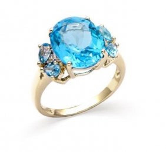6.94 CT Certified Swiss Topaz & Diamond 14K Ring $6,374: 6.10 Cts of Oval shape Swiss Blue Topaz 12 x 10 mm center + 0.82 Ct of Pear shape Swiss Blue Topaz 5x3 mm sides quality AAA no treatment. 0.02 Ct round diamonds 1.0 mm , I-J , I1-I2 no treatment. 4.22