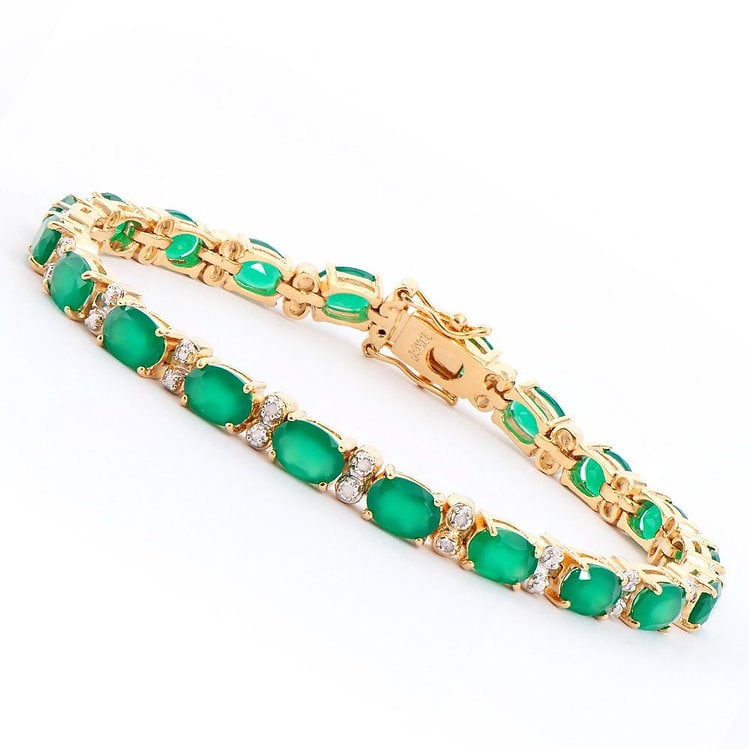 13 CT Green Agate Diamond Tennis Bracelet: Master jewelers designed your bracelet with 18 pieces of GENUINE 5X4mm oval Green Agate. 18 pieces of GENUINE single cut diamonds, 0.1 carat tw. 11.4 grams of Base Metal layered with 18K Gold. The