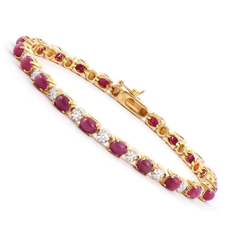 12.26 CT Cabochon Ruby & Diamond 18KGP Designer: 21 pieces of GENUINE 5X4mm oval cabochon Rubies quality AAA no treatment.2 pieces of GENUINE single cut diamonds, 0.02 carat tw.11.75 grams of brass layered with 18K yellow gold.The length is around 7