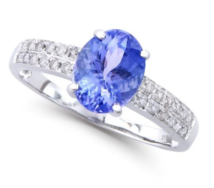 $5,495 Value! 1.95Ct GLS Certified Natural Tanzanite Diamond 14K Ring: Gemstone Description:TanzaniteColor: Purple BlueShape: OvalSize: 9x7Quantity: 1CT: 1.75 Diamond Description:Shape: RoundsSize: 1.2mm Quantity: 24CT: 0.2Grade: I1-I2Color: H-I Material Information:Prim