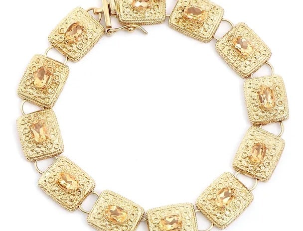 5.05 Cts Natural Citrine 18K Gold Plated Antique Style Designer Bracelet $1,395!: Gemstone DescriptionGemstone: CitrineColor: OrangeShape: OvalSize: 6x4Quantity: 12CTW: 5.05 Material Information:Plating Material: Yellow GoldPlating Material Karat: 18kPrimary Material: Base Metal Je