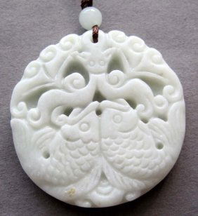 Chinese White Jade Twin Koi Fish Pendant: The Royal Cameo Carving Jade Charm was carved from a piece of fine grained Jade gemstone more than 200 years ago. The design is unique and very lovely and the carving is delicately performed. Size: 35