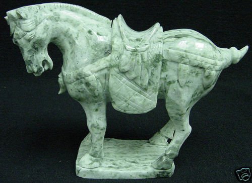 Royal Jade Saddled Tang Horse: This horse is made from one piece solid Taiwan jade. It appears light green with some area dark green. It comes with a wooden base. Size: L: 8", W: 3", H: 8"