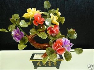 REAL JADE BONSAI FLOWER: THIS FLOWER IS MADE FROM VARIETY OF COLOR JADE. THERE ARE YELLOW AND RED. ITS LEAF IS MADE OF TAIWAN JADE. IT IS AN IDEAL DECORATION FOR YOUR LIVING ROOM, DINNING ROOM, OFFICE AND KITCHEN. Width: 14",