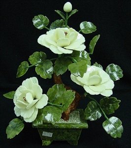REAL WHITE JADE BONSAI FLOWER: This flower is made of real white jade. The leaves are made of Taiwan jade, dark green, as well as the pot. The branches can be bend over, so you can adjust it the way you like. L: 12", W: 8", H: 13".