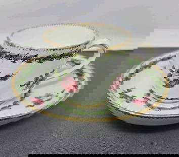 Sevres Cup and Saucer Green Laurel, Roses C. 1773: Beautiful antique Sevres cup and saucer set. Green laurel with pink roses pattern and gold gilt scalloped edge. Circa 1773, it has the date code U. It has a painter mark of NQ for Niquet who was a dec