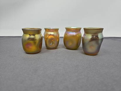 Set 4 LCT Tiffany Favrile Gold Shot Glasses: Beautiful Tiffany L.T. C. Hand blown favrile saki or shot glass set of 4. No chips or cracks, very nice condition. It is pinched glass that measures approximately 1 3/4 inches tall and 1 1/2 inches wi