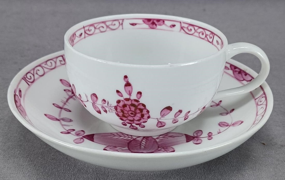 Meissen Marcolini Indian Pattern Tea Cup & Saucer: Nice porcelain tea cup and saucer. Decorated with the hand painted Indian pattern in puce. Marked on the bottom with the blue crossed swords mark with a star underneath, used by Meissen between 1774 a