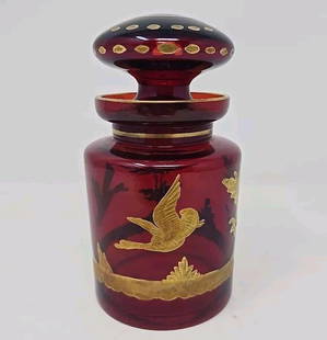 Antique Bohemian Glass Ruby and Gold Dresser Jar: Antique Bohemian ruby red glass intaglio with gold paint dresser jar. Measures approximately 5 1/2 inches tall and 3 inches wide. Very good condition without chips or cracks. Gold is in good