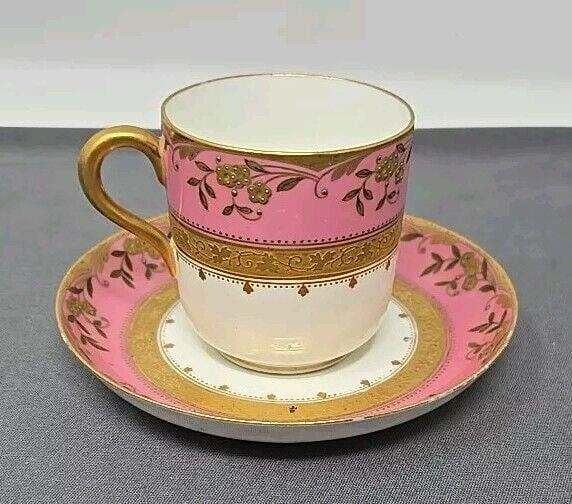 Brownfield's Pink & Gold Demitasse Cup & Saucer: Antique Brownfield's Demitasse Tea Cup & Saucer, Aesthetic Period. The cup stands 2 1/4 inches tall and has a 2 1/4 inch diameter. The saucer measures 4 1/2 inches across. Manufactured for Davis, Coll