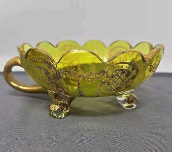 Moser Type Bohemian Raised Gold Chartreuse Nappy: Moser Type Bohemian Raised Gold Scrollwork Yellow Green Nappy Dish. Scalloped edges, cabriolet legs, and applied gilt glass handle. Measures approximately 4 1 /4 inches in diameter and 2 inches in