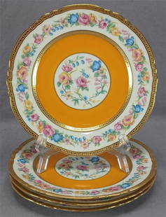 Set of 4 Limoges Orange Floral Gold 8 5/8 " Plate: Set of 4 antique porcelain plates. Nicely decorated with pink, blue and yellow flowers over ivory in the center framed by a thin ring of gold gilding and a wide band of orange. With gold encrusted dia