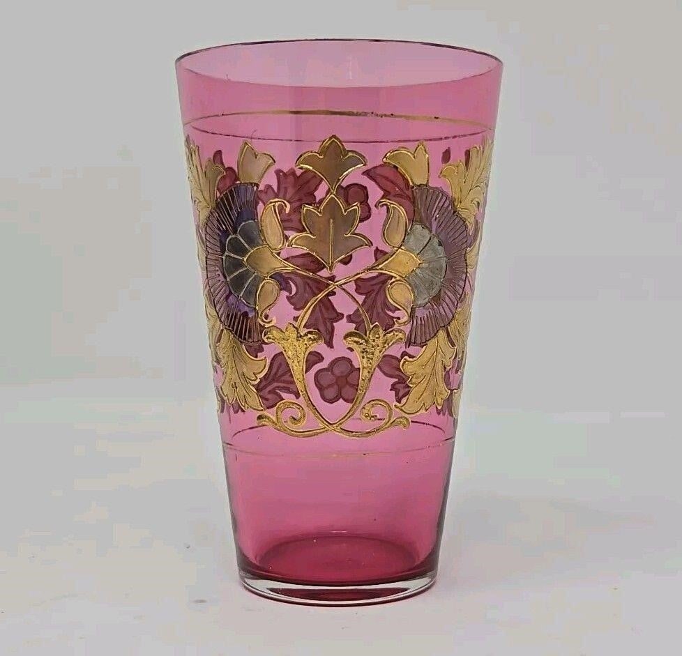 Signed Fritz Heckert Cranberry Juice Glass 3 3/4": Lovely art nouveau Victorian antique Bohemian juice glass. Marked Fritz Heckert Raised gold and silver with clear enamel petals. Measures approximately 3 3/4 inches tall and 2 1/4 inch diameter. Very