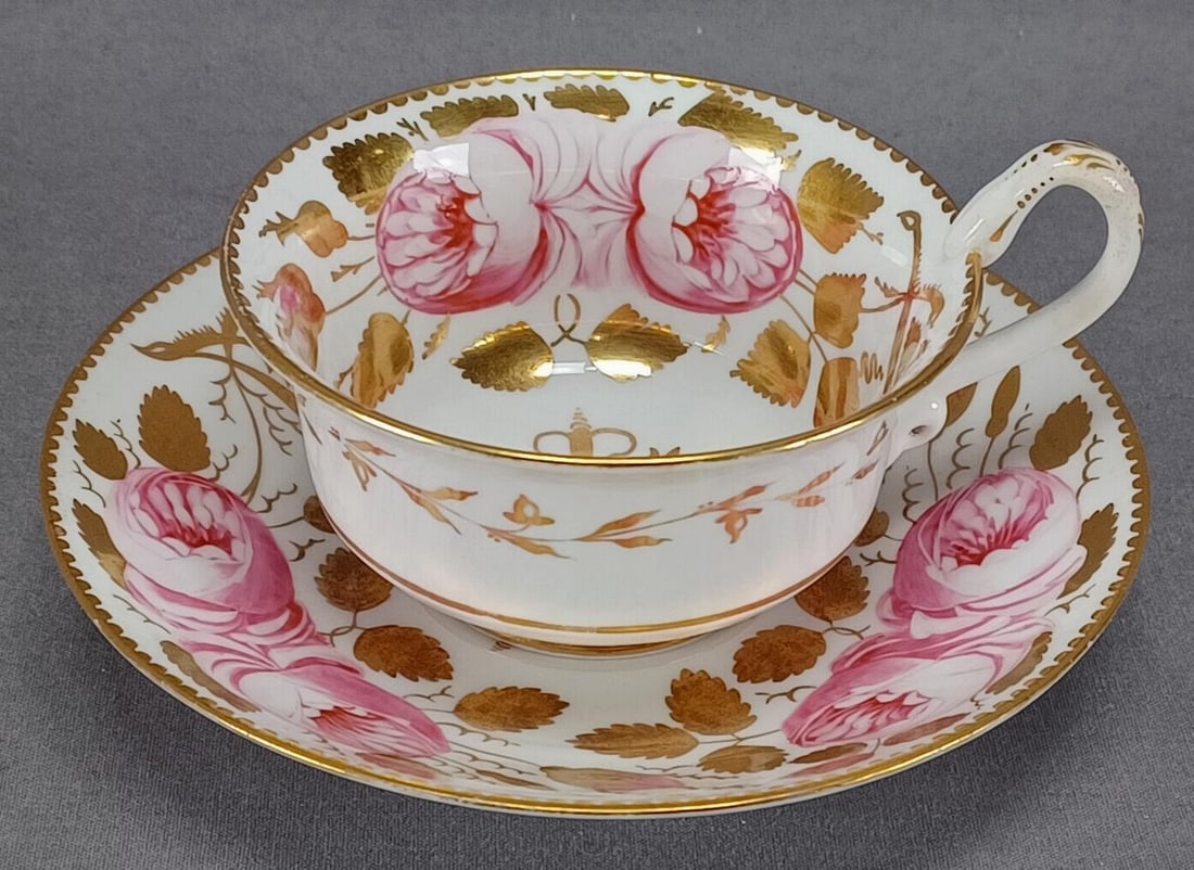 Copeland 3880 Pink Rose & Gold Tea Cup & Saucer E: Antique bone china tea cup and saucer. Decorated in pattern 3880 with large pink "Swansea roses" and gold leaves on the inside of the cup and on the saucer. Gold gild medallion in the center of the cu