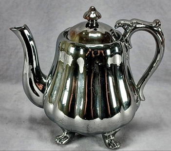 Antique British Silver Luster Rococo Style Teapot: Nice antique British silver luster / silver lustre redware red earthenware teapot in a Rococo style form with four feet. Unmarked. Circa 1830 to 1840s.Has some wear to the silver luster and two small