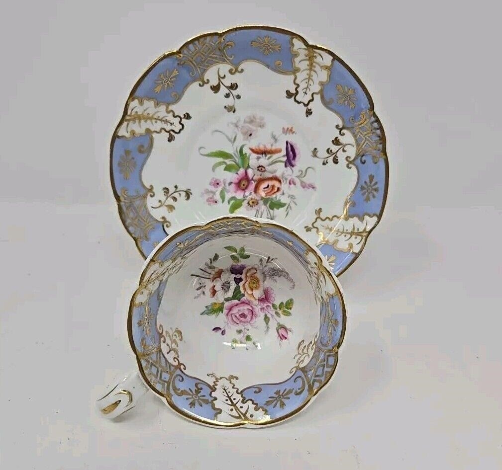 RIDGWAY Floral Blue Gold Cup & Saucer C. 1810-50: Ridgway tea cup and saucer marked with pattern number 2 / 5254. Beautiful hand painted pale blue, almost lavender, with gold gilt and colorful flowers. Very good condition with no chips, cracks, or no