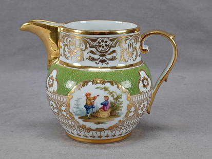 RK Dresden Watteau Scene 5 1/2 Inch Creamer: Antique porcelain creamer. Very nicely decorated with a hand painted courting couple framed in fancy gold scrollwork gilding on each side. The courting couple scene on one side depicts a man in yellow